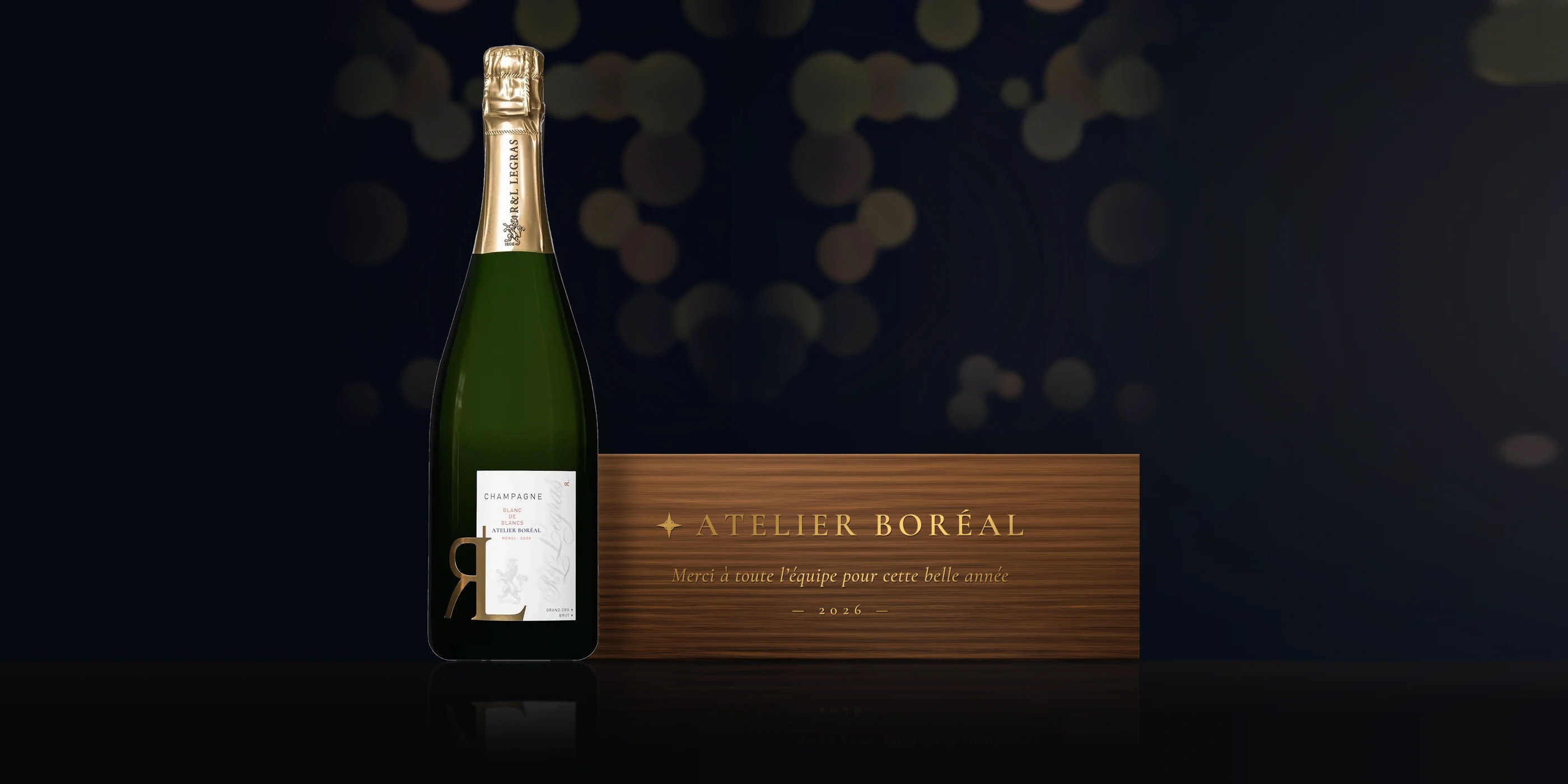 Exemple entreprise : Blanc de Blancs R&L Legras à l'étiquette Atelier Boréal et son coffret en bois marqué à l'or.